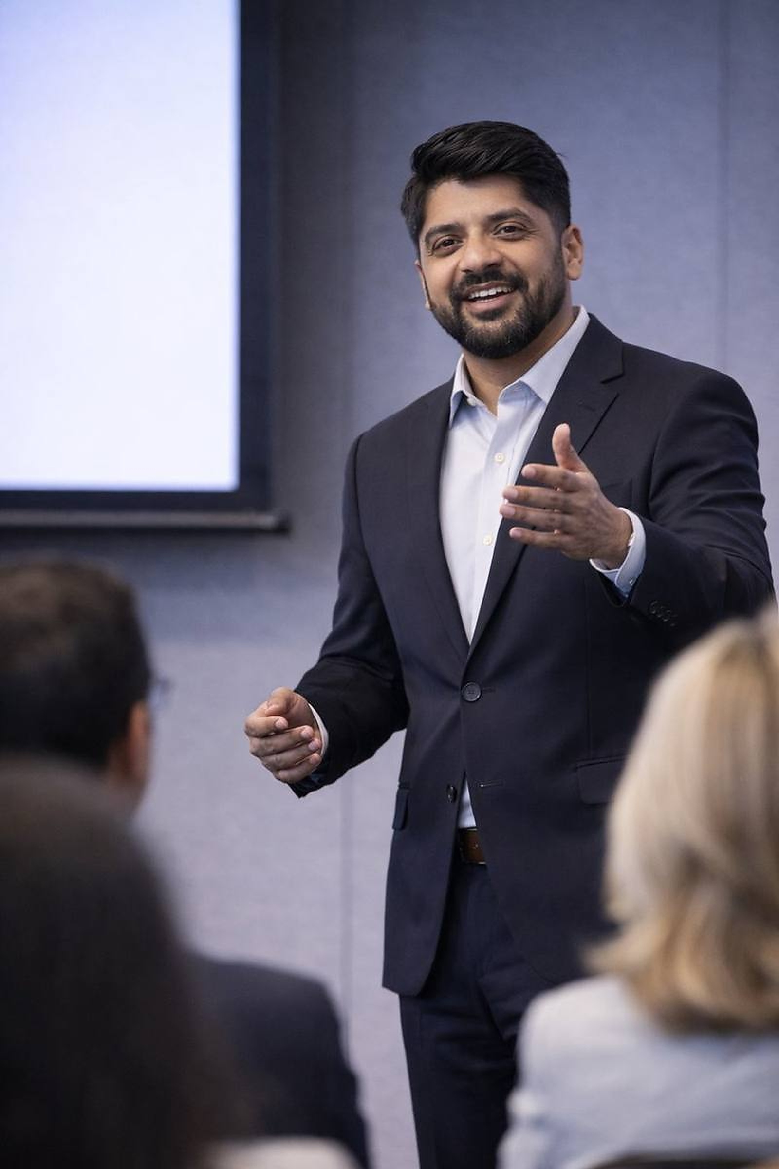 Sekhar Palanisamy presenting at a business conference